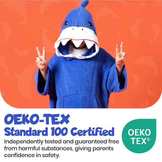 Child wearing a blue shark costume against an orange background with OEKO-TEX certification text.