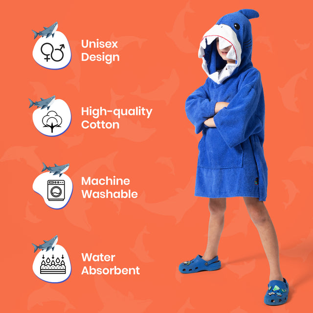 Child wearing a blue shark-themed robe with product features on an orange background